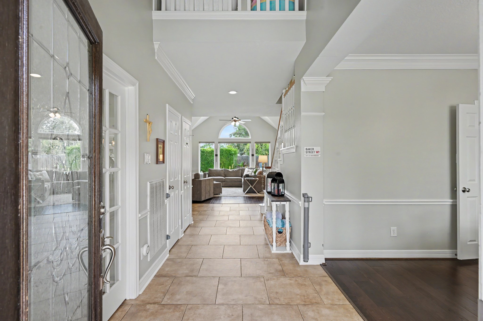 14938 Codys Run Cypress, TX 77429 - Photo 5 of 50 As you enter the home, you greeted by the view through the living area to the backyard. The entry is two story and is flanked by the dining room and home office.