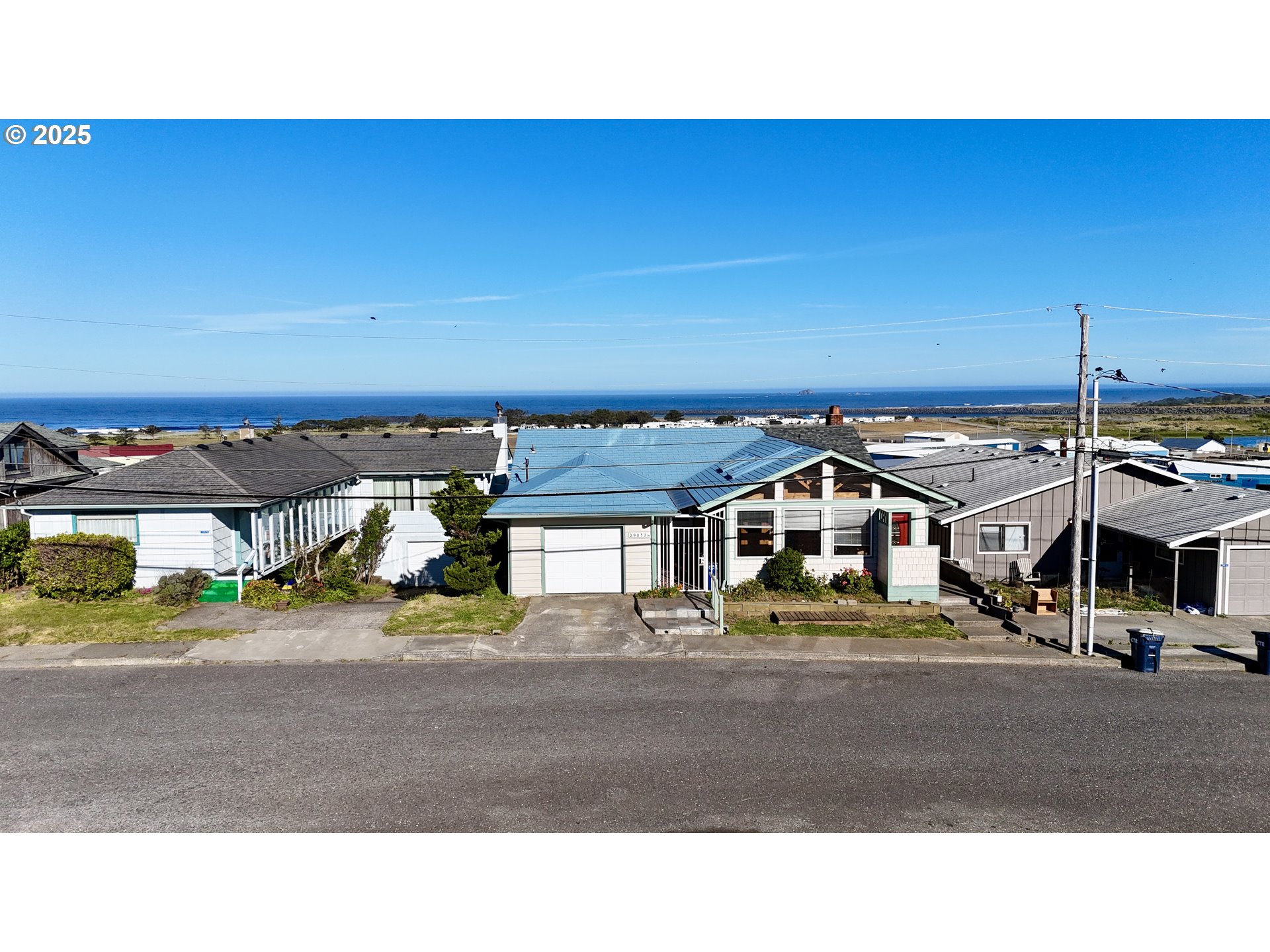 a black and white photo of a road