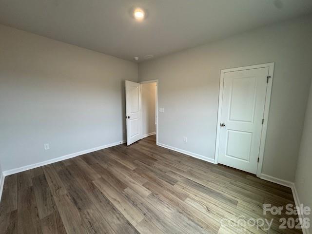 206 Rodeo Drive Shelby, NC 28150 - Photo 17 of 19 a view of an empty room and wooden floor