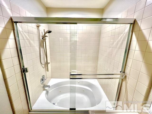 1689 Clover Hill Trail Reno, NV 89523 - Photo 12 of 32 a bathroom with a bathtub and a shower