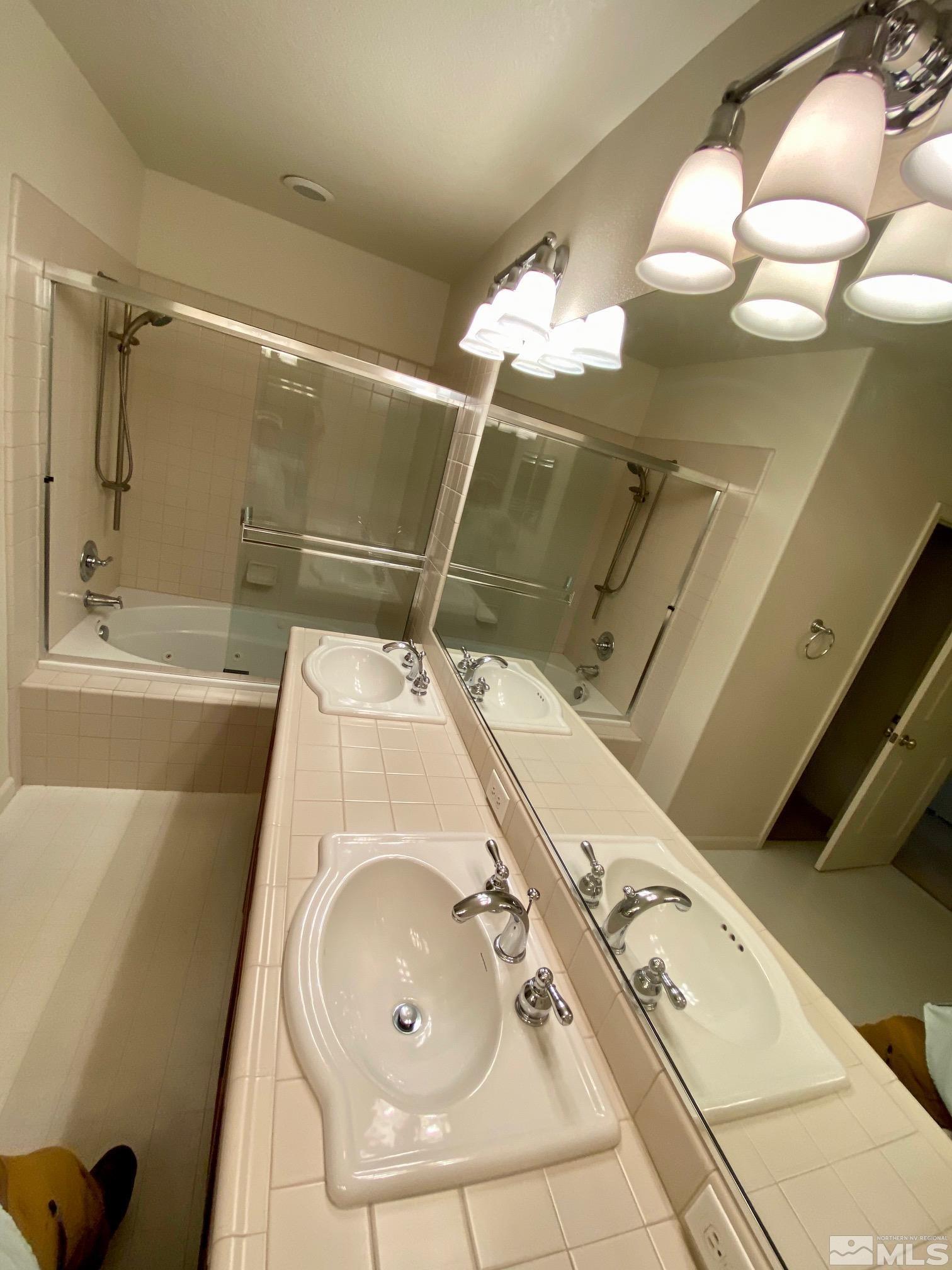 1689 Clover Hill Trail Reno, NV 89523 - Photo 27 of 32 a utility room with dryer and washer
