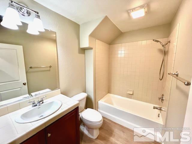 1689 Clover Hill Trail Reno, NV 89523 - Photo 32 of 32 a bathroom with a sink a toilet and shower