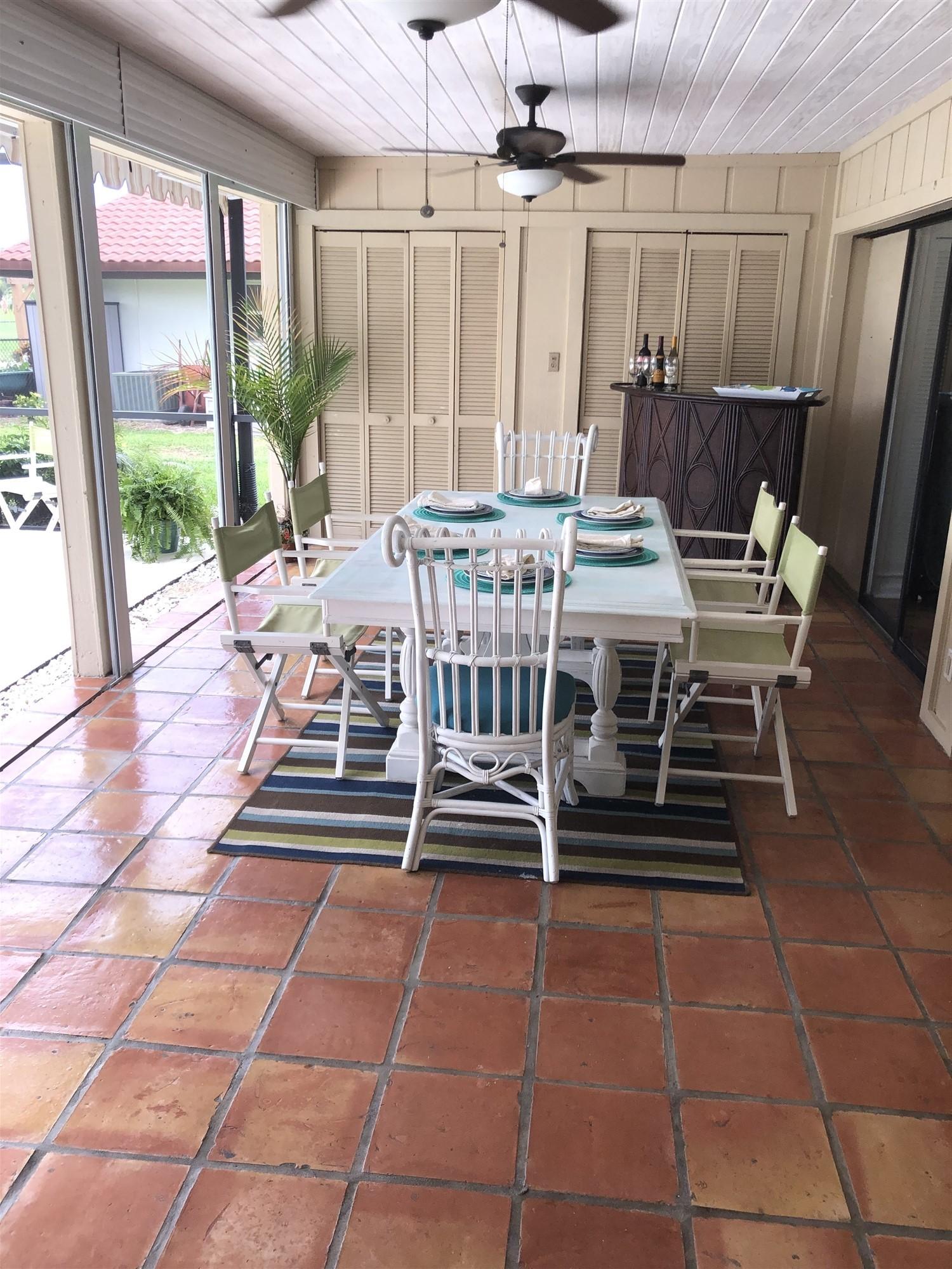 67 Fairview West Tequesta, FL 33469 - Photo 23 of 25 a view of a dining room with furniture window and outside view