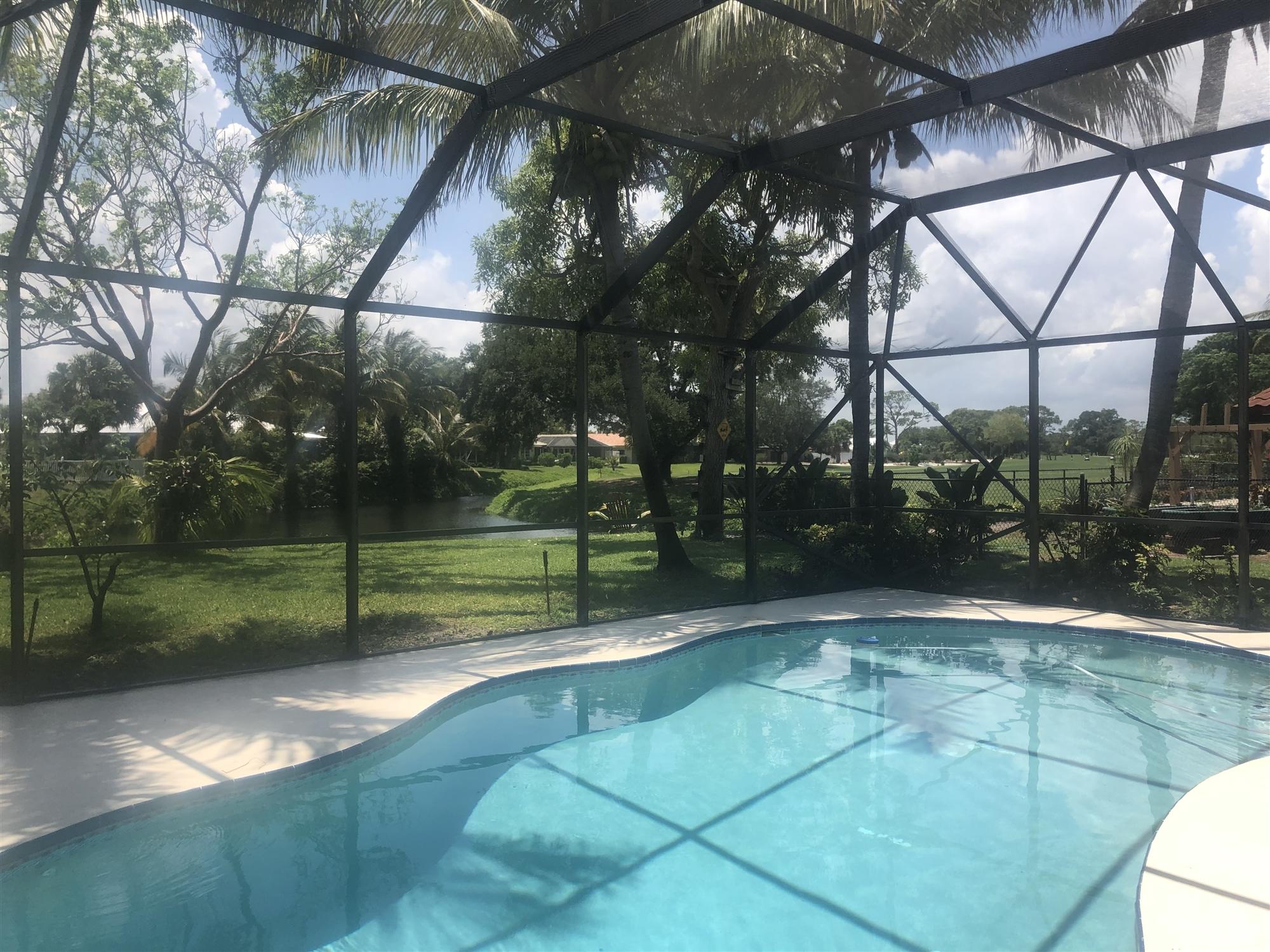 67 Fairview West Tequesta, FL 33469 - Photo 6 of 25 a view of a backyard