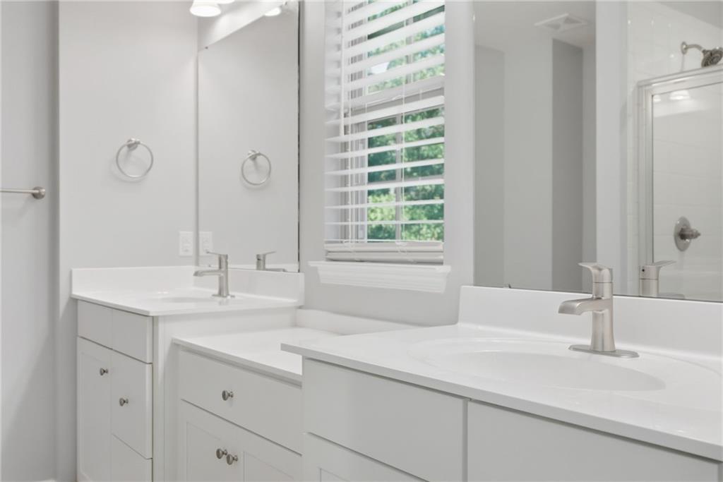 141 Arbor Trail Drive McKees Rocks, PA 15136 - Photo 26 of 44 a bathroom with a sink and a mirror