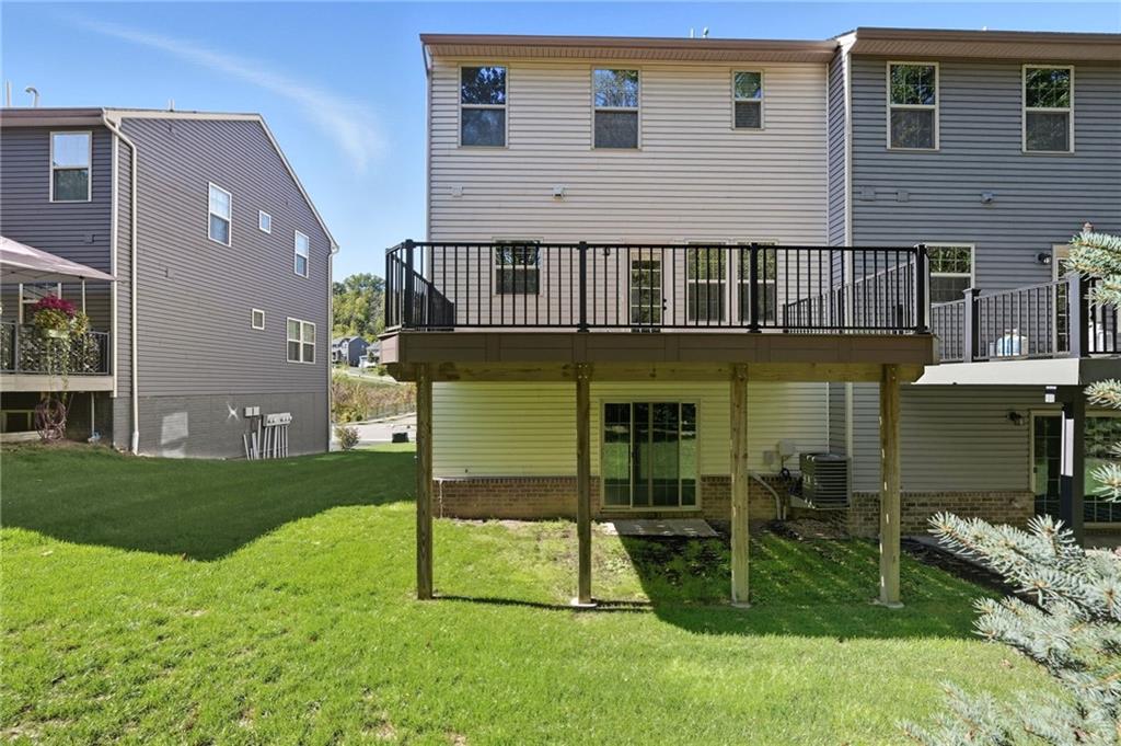 141 Arbor Trail Drive McKees Rocks, PA 15136 - Photo 35 of 44 a front view of a house with a yard table and chairs