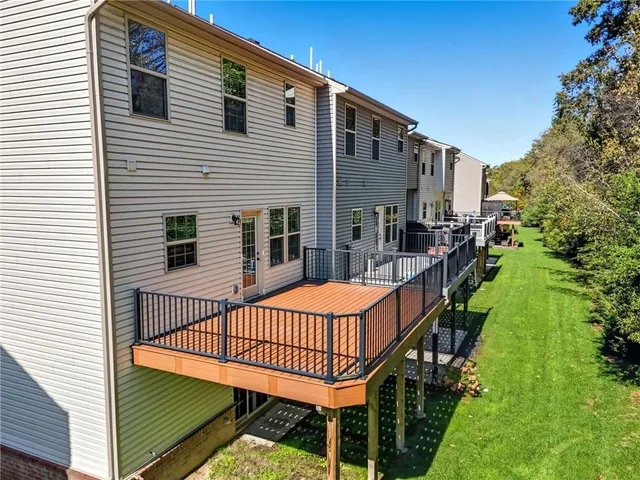 a view of a balcony with chairs