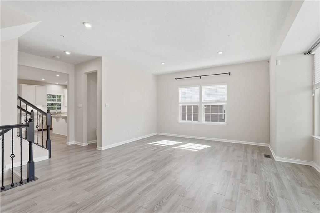 141 Arbor Trail Drive McKees Rocks, PA 15136 - Photo 6 of 44 a view of an empty room with wooden floor and a window