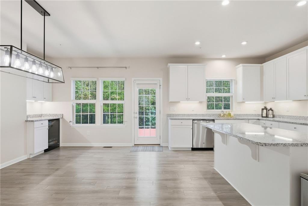 141 Arbor Trail Drive McKees Rocks, PA 15136 - Photo 8 of 44 a large kitchen with stainless steel appliances granite countertop a sink stove and a refrigerator