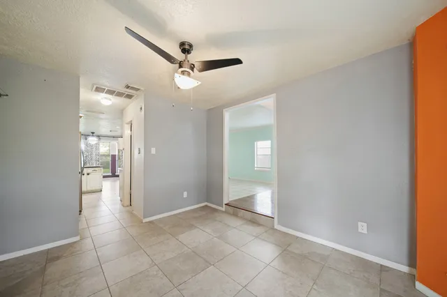 a view of an empty room and a gallery