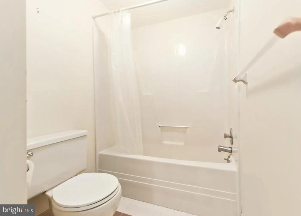 109 Valley Stream Circle, Unit 109A Chesterbrook, PA 19087 - Photo 8 of 8 a bathroom with a toilet and a bathtub