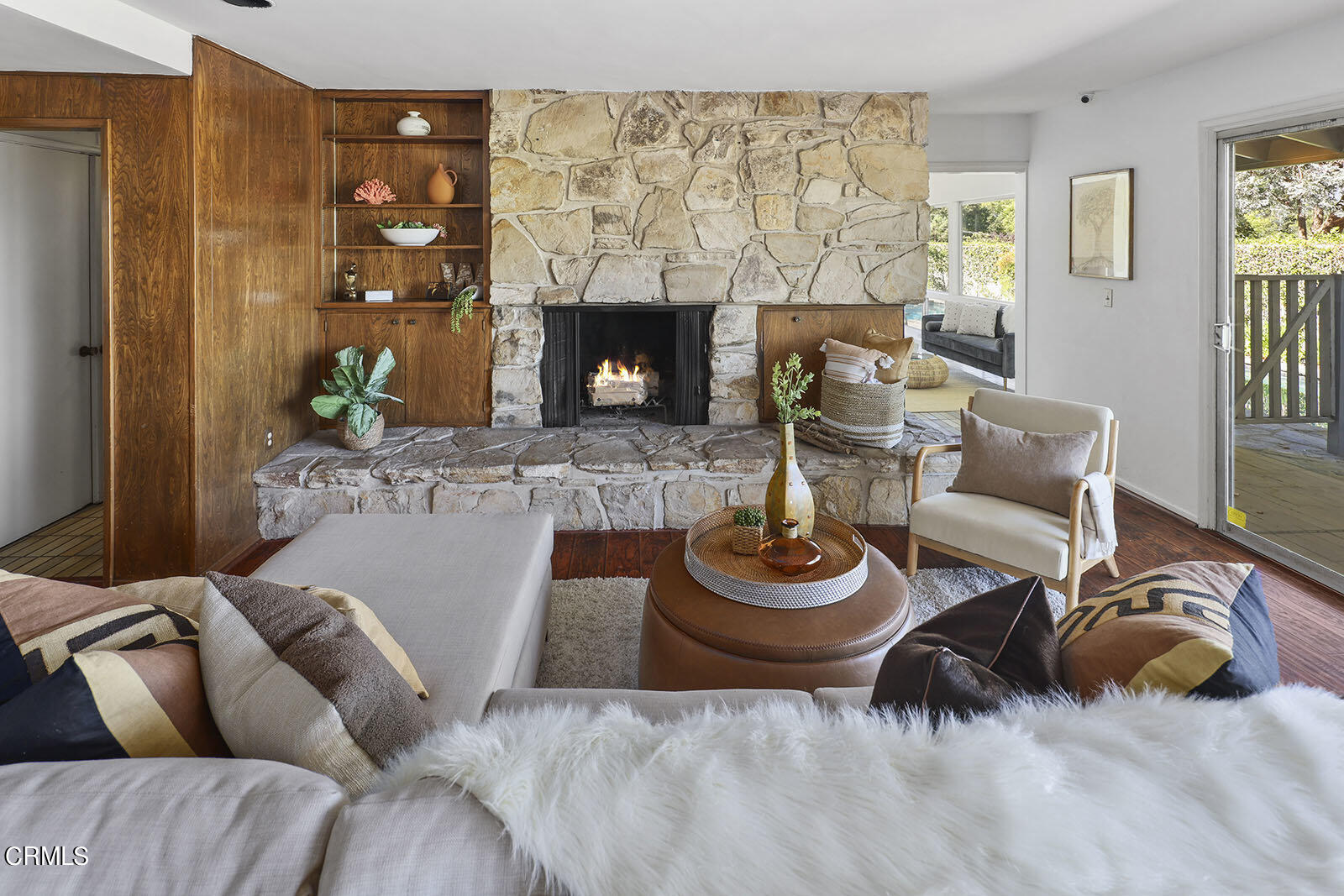 1188 Rancheros Place Pasadena, CA 91103 - Photo 12 of 57 a living room with furniture and a fireplace