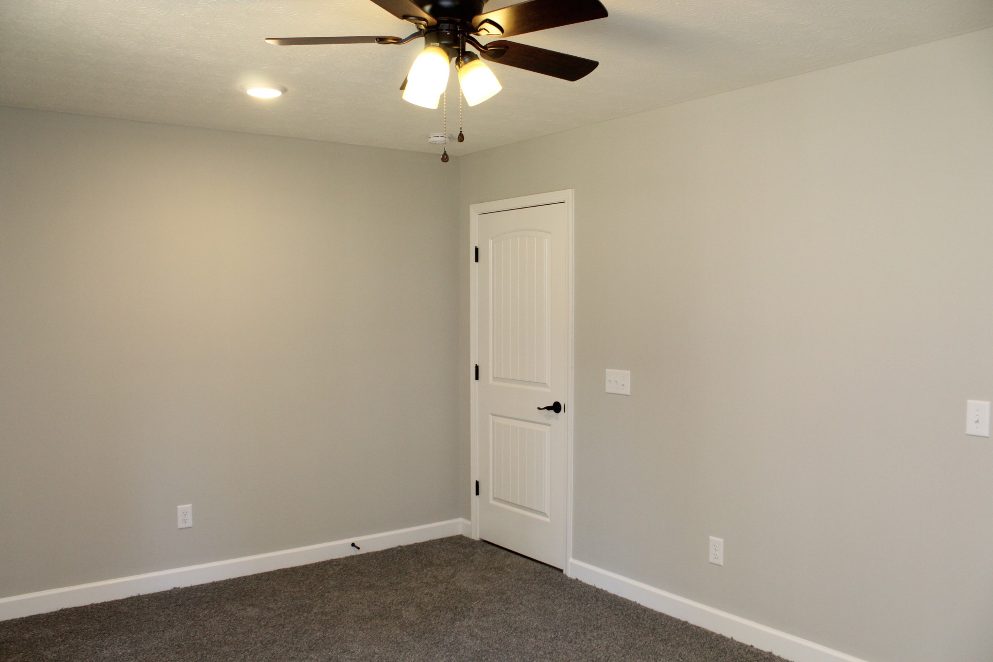 3835 Union Camp Road Lafayette, TN 37083 - Photo 22 of 27 an empty room with a ceiling fan and a fan