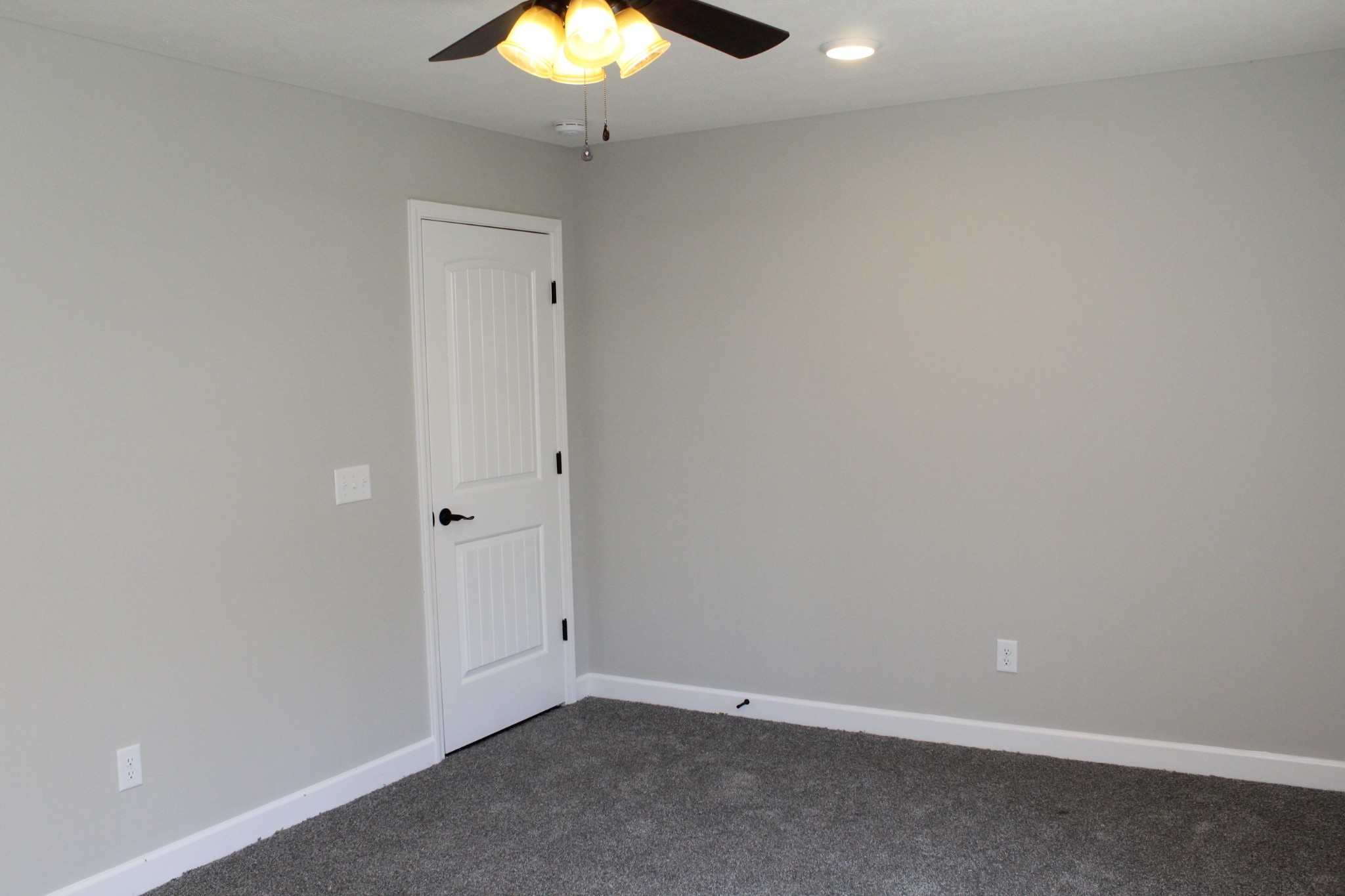 3835 Union Camp Road Lafayette, TN 37083 - Photo 26 of 27 an empty room with a chandelier fan