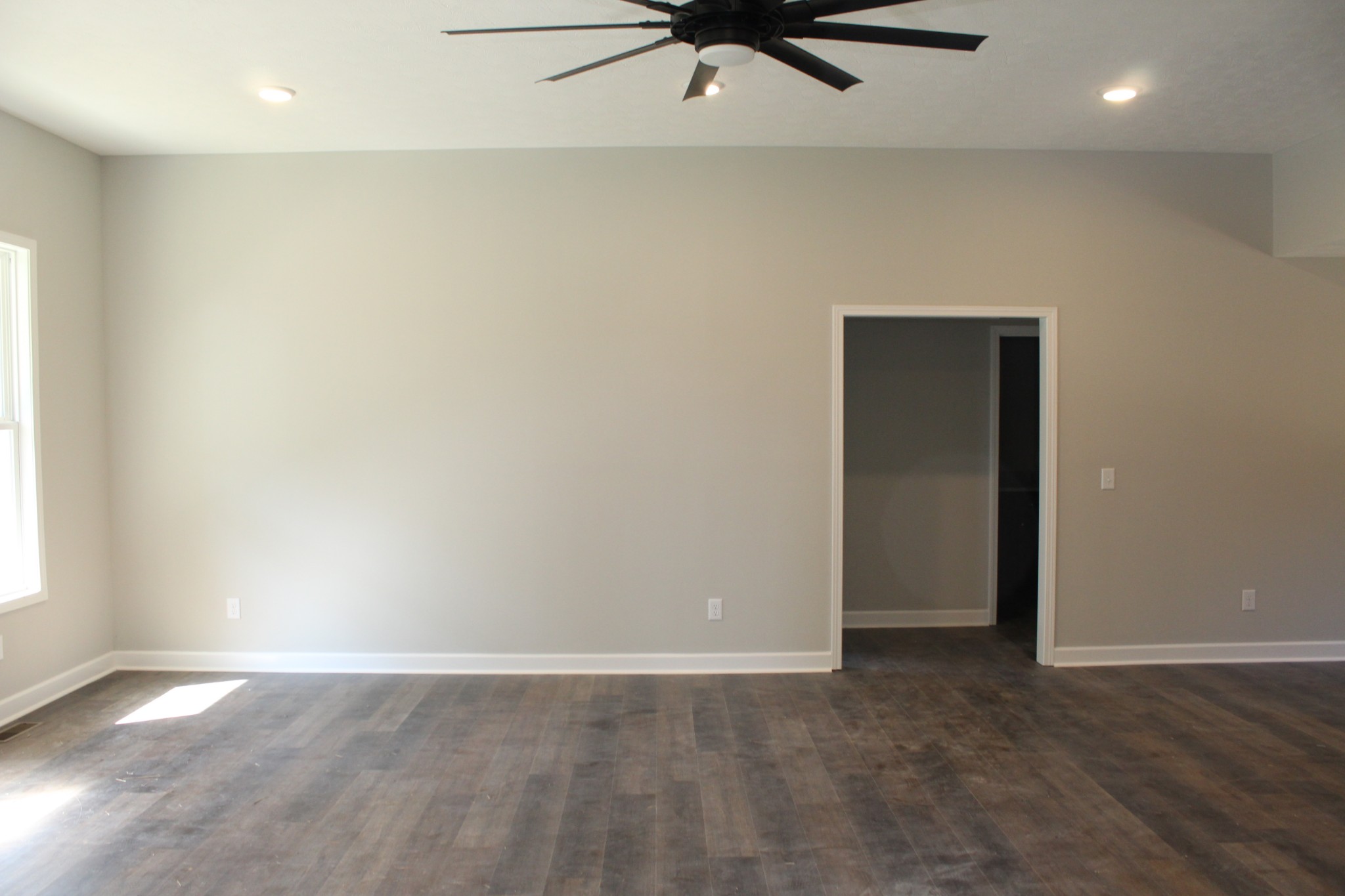 3835 Union Camp Road Lafayette, TN 37083 - Photo 10 of 27 an empty room with a ceiling fan and carpet