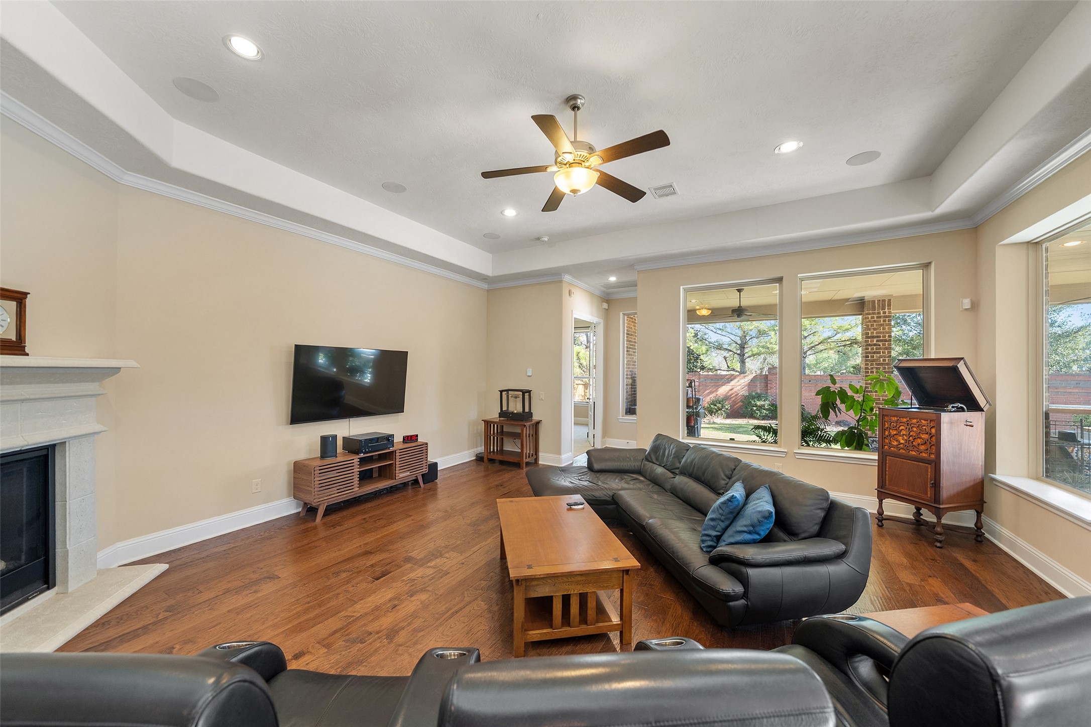 27626 South Colt Shadow Lane Spring, TX 77386 - Photo 19 of 50 a living room with furniture and a flat screen tv