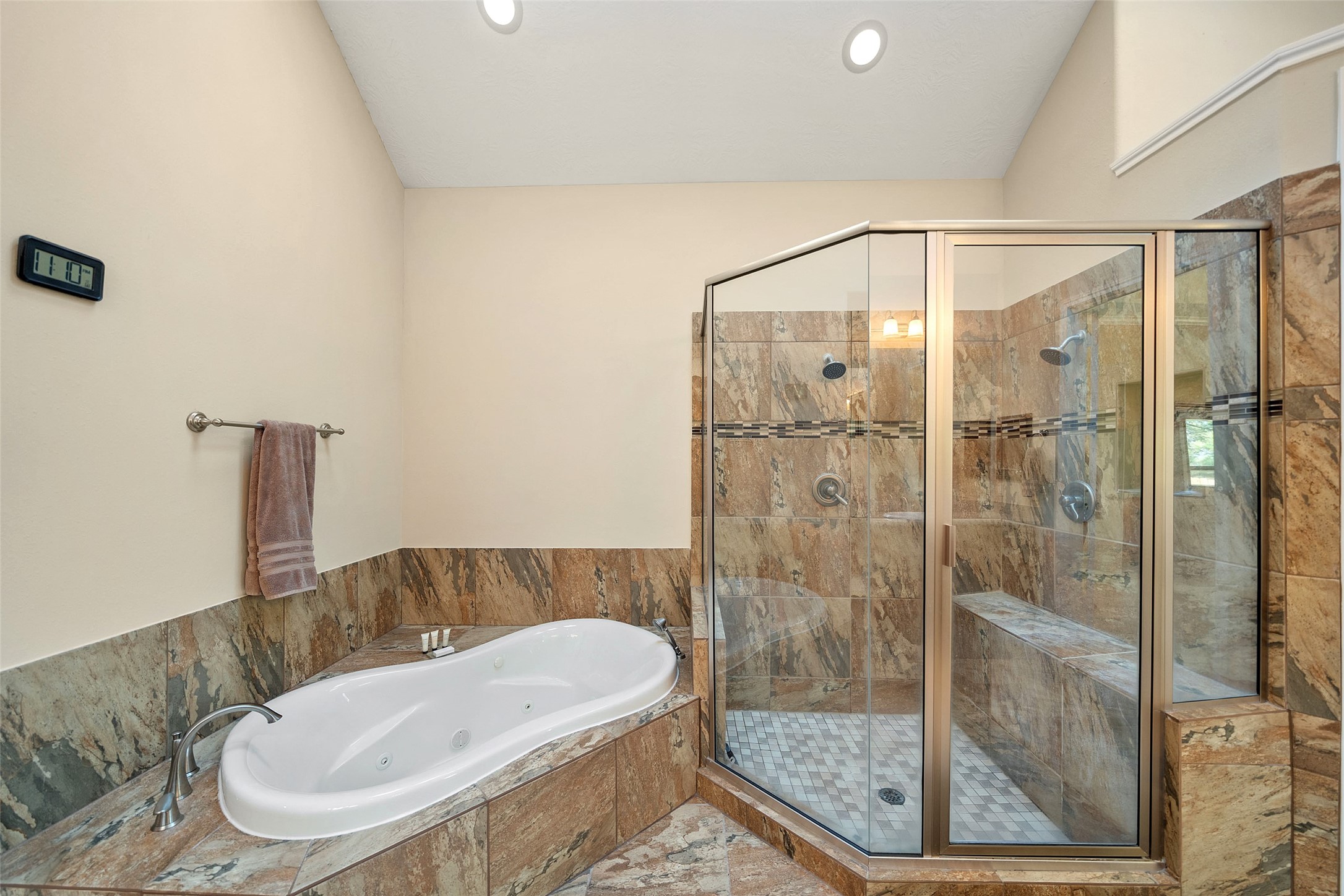 27626 South Colt Shadow Lane Spring, TX 77386 - Photo 21 of 50 a bathroom with a bath tub and shower