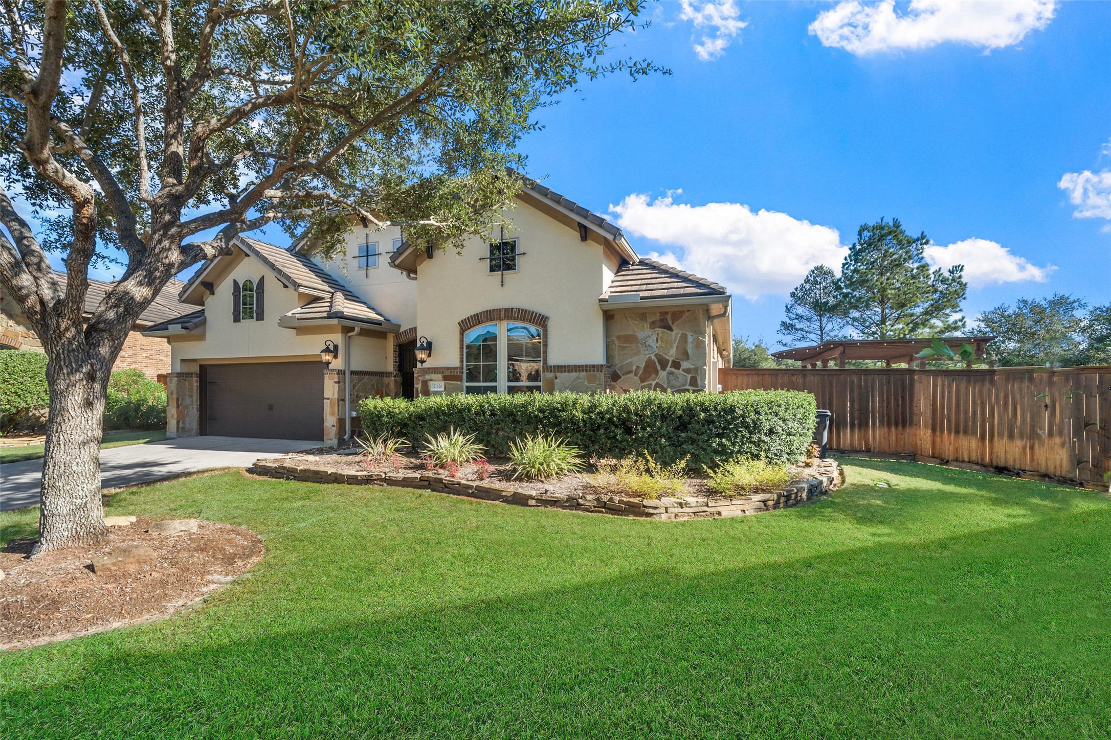 27626 South Colt Shadow Lane Spring, TX 77386 - Photo 34 of 50 a front view of a house with a yard