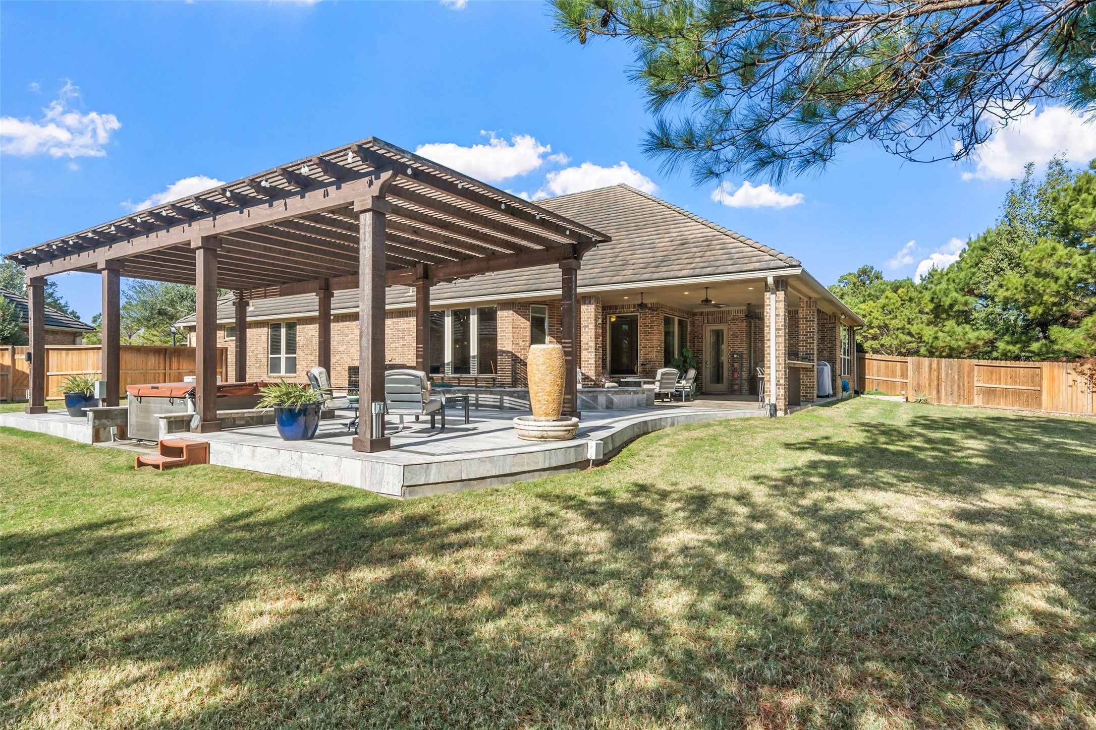 27626 South Colt Shadow Lane Spring, TX 77386 - Photo 37 of 50 a view of a house with swimming pool and porch with furniture