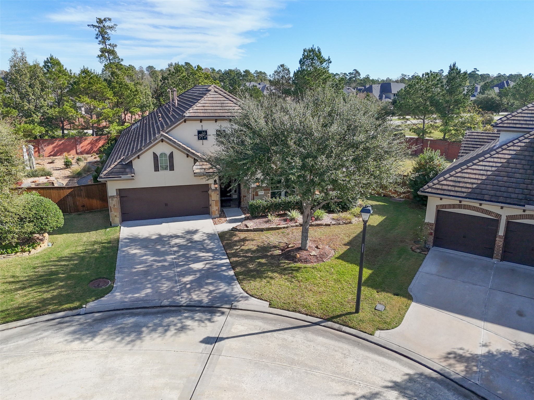 27626 South Colt Shadow Lane Spring, TX 77386 - Photo 41 of 50 a front view of a house with garden