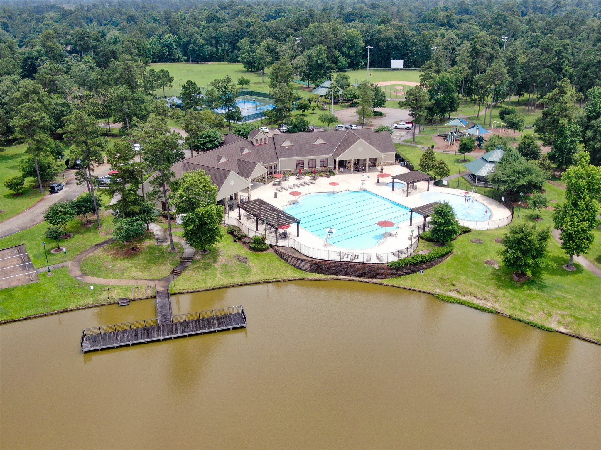 27626 South Colt Shadow Lane Spring, TX 77386 - Photo 44 of 50 an aerial view of a house with a swimming pool outdoor seating and yard