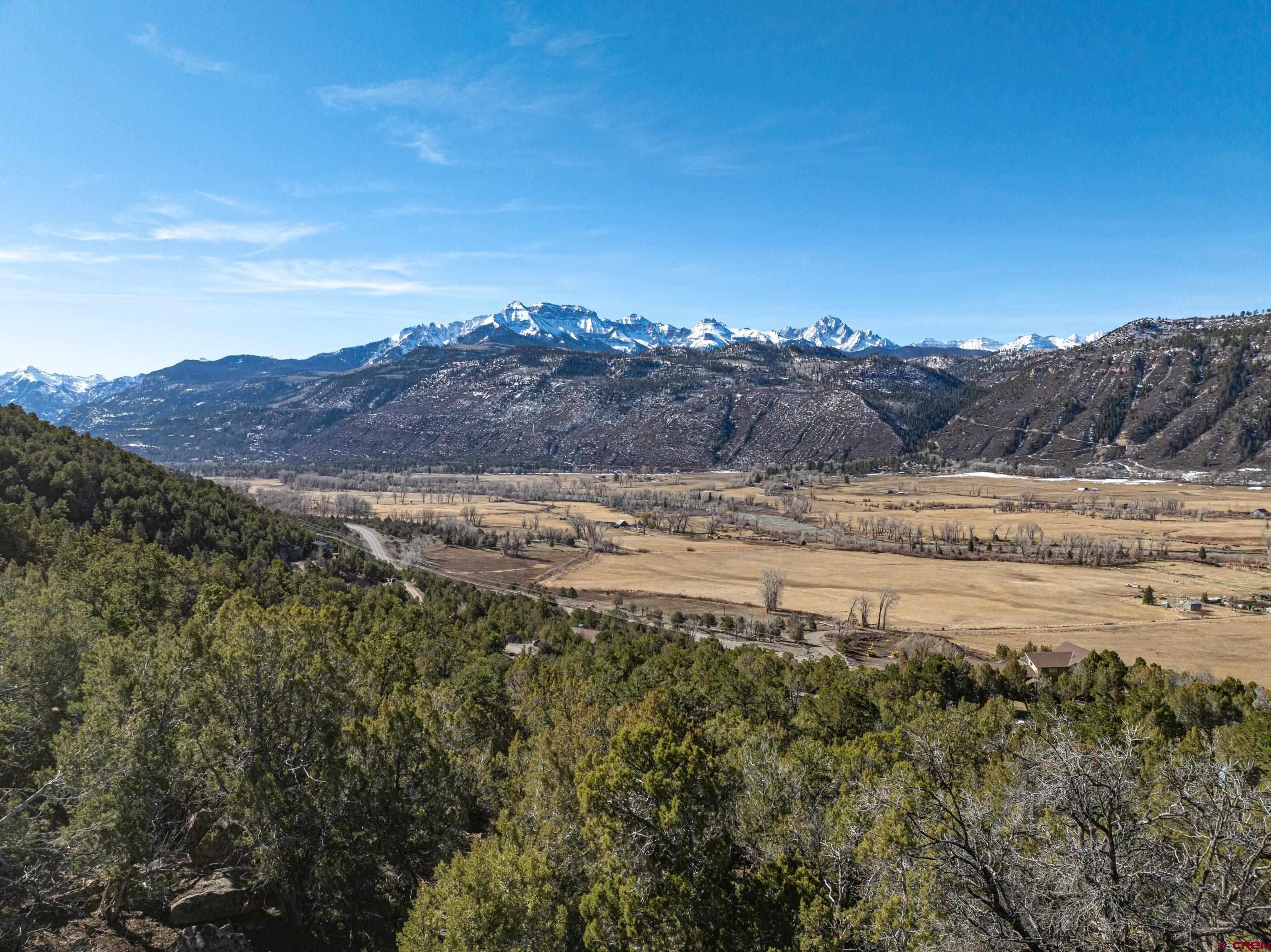 Tbd Elsie Trail Ridgway, CO 81432 - Photo 16 of 35 a view of a lake with mountains in the background