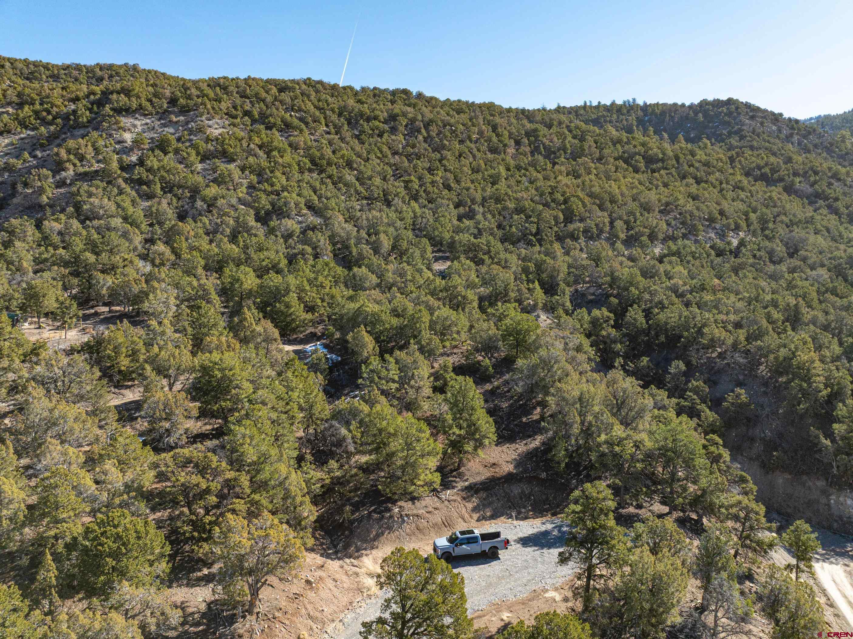 Tbd Elsie Trail Ridgway, CO 81432 - Photo 10 of 35 a view of a dry yard with mountains in the background