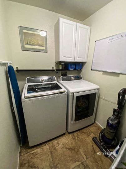 1109 Rebecca Avenue Ridgecrest, CA 93555 - Photo 49 of 50 a utility room with dryer and washer