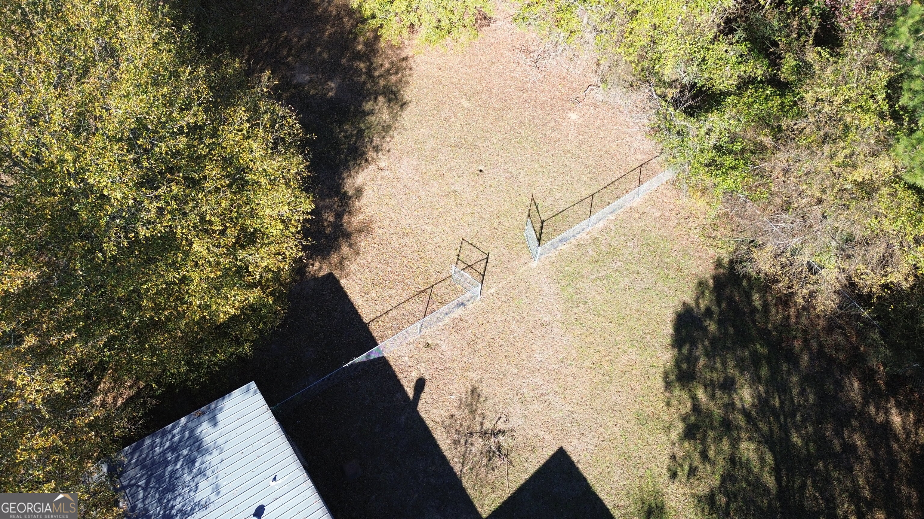 6326 Riggins Mill Road Dry Branch, GA 31020 - Photo 106 of 108 a view of balcony with wooden floor and fence