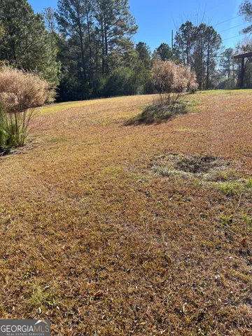 a room with furniture and a flat screen tv