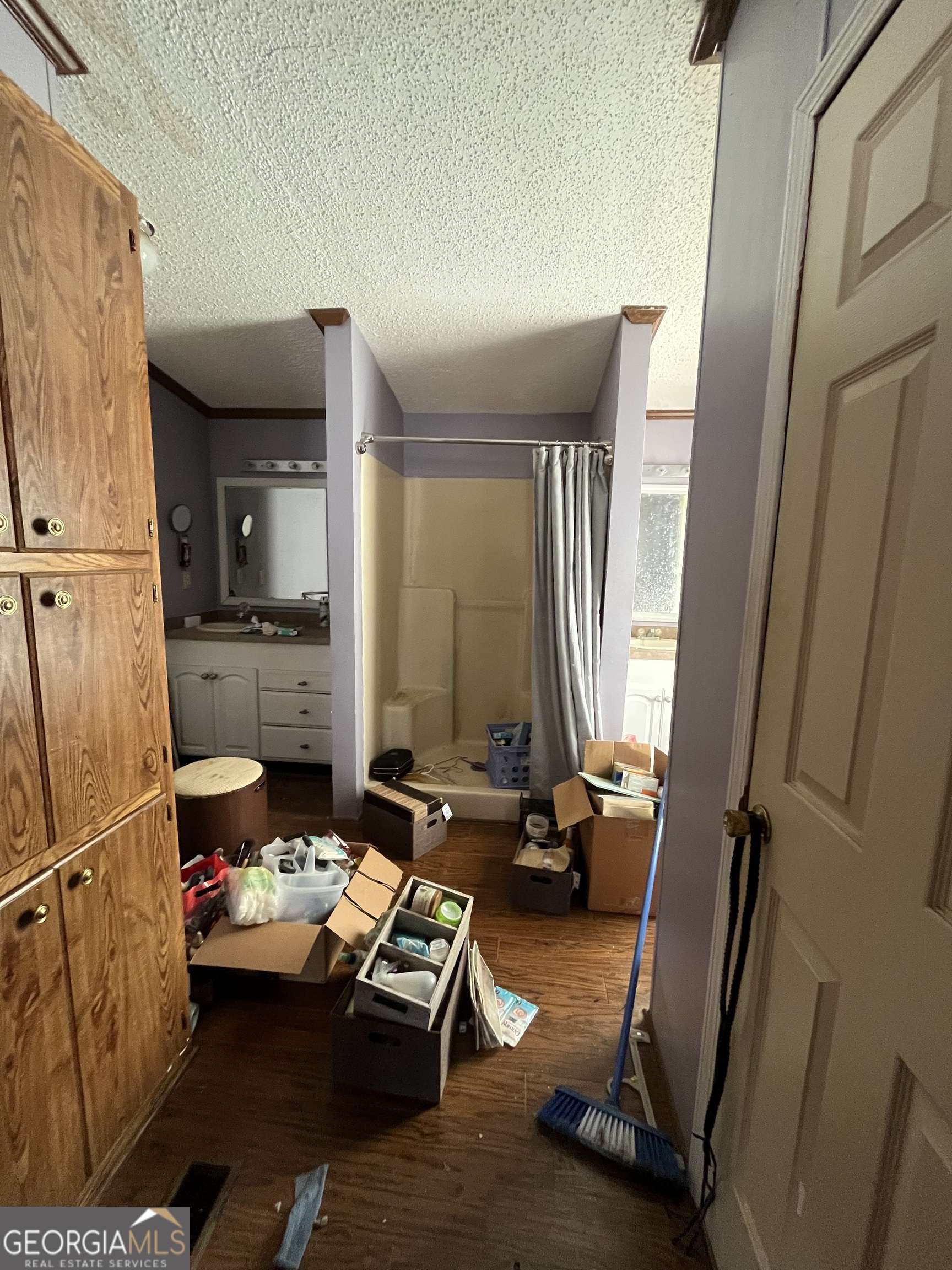 6326 Riggins Mill Road Dry Branch, GA 31020 - Photo 63 of 108 a room with furniture and a window