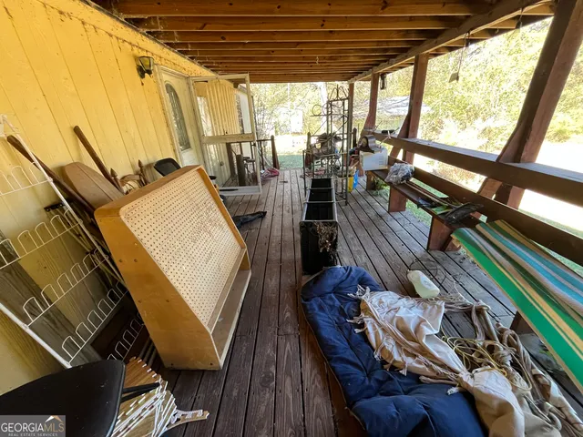 a white toilet sitting next to a bath tub
