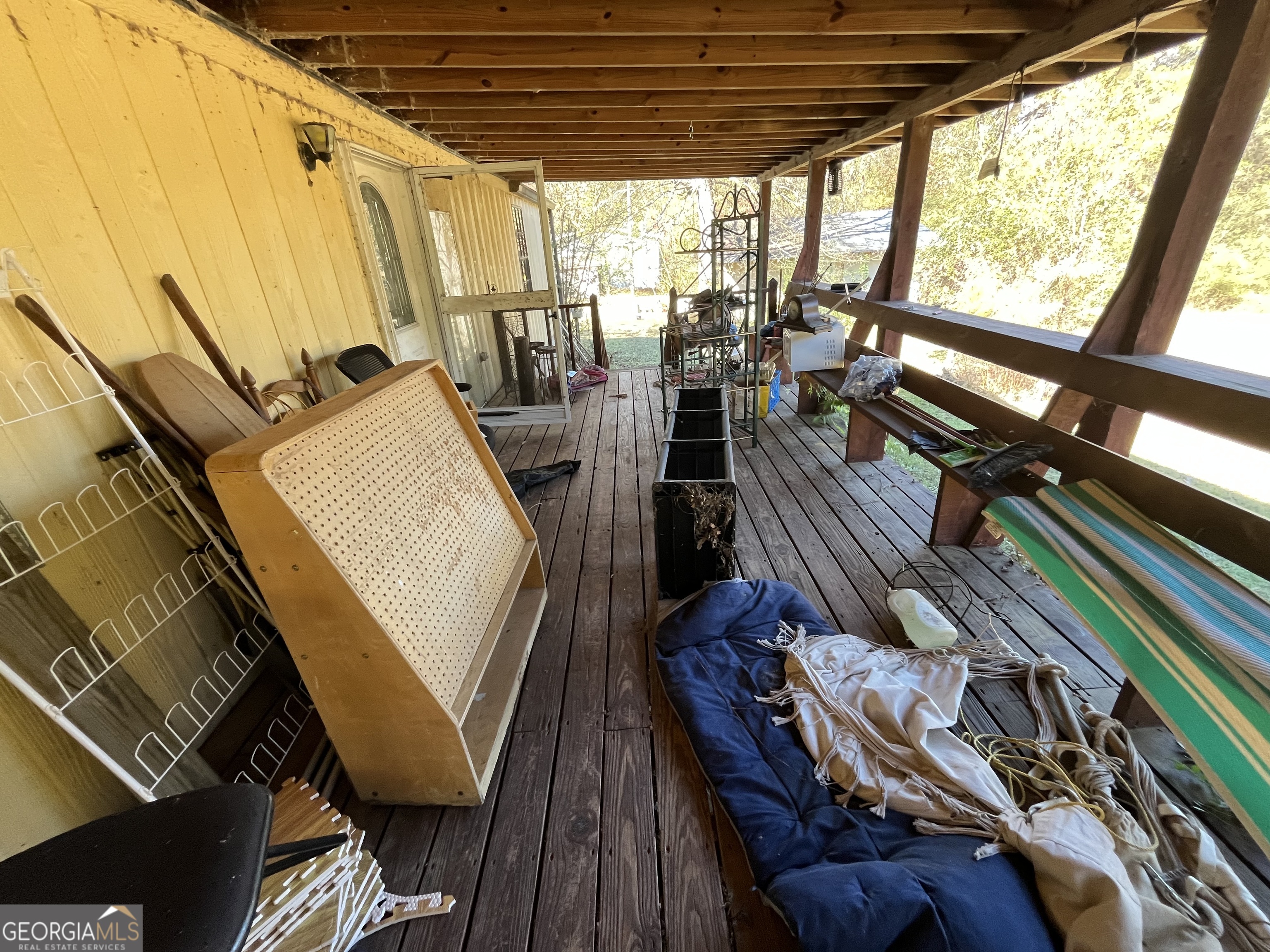 6326 Riggins Mill Road Dry Branch, GA 31020 - Photo 7 of 108 a view of living room with furniture and wooden floor