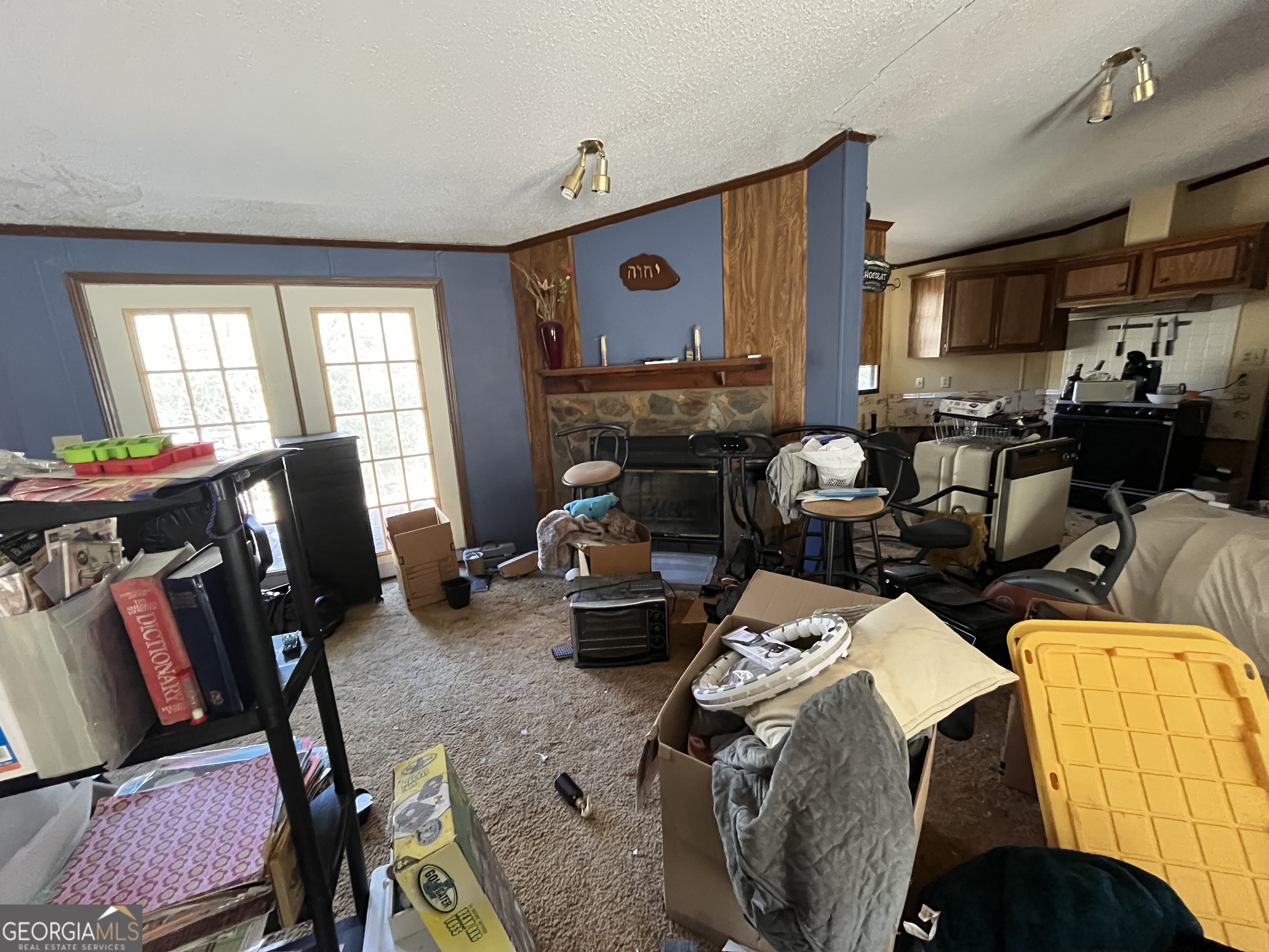 6326 Riggins Mill Road Dry Branch, GA 31020 - Photo 75 of 108 a living room with furniture and a flat screen tv