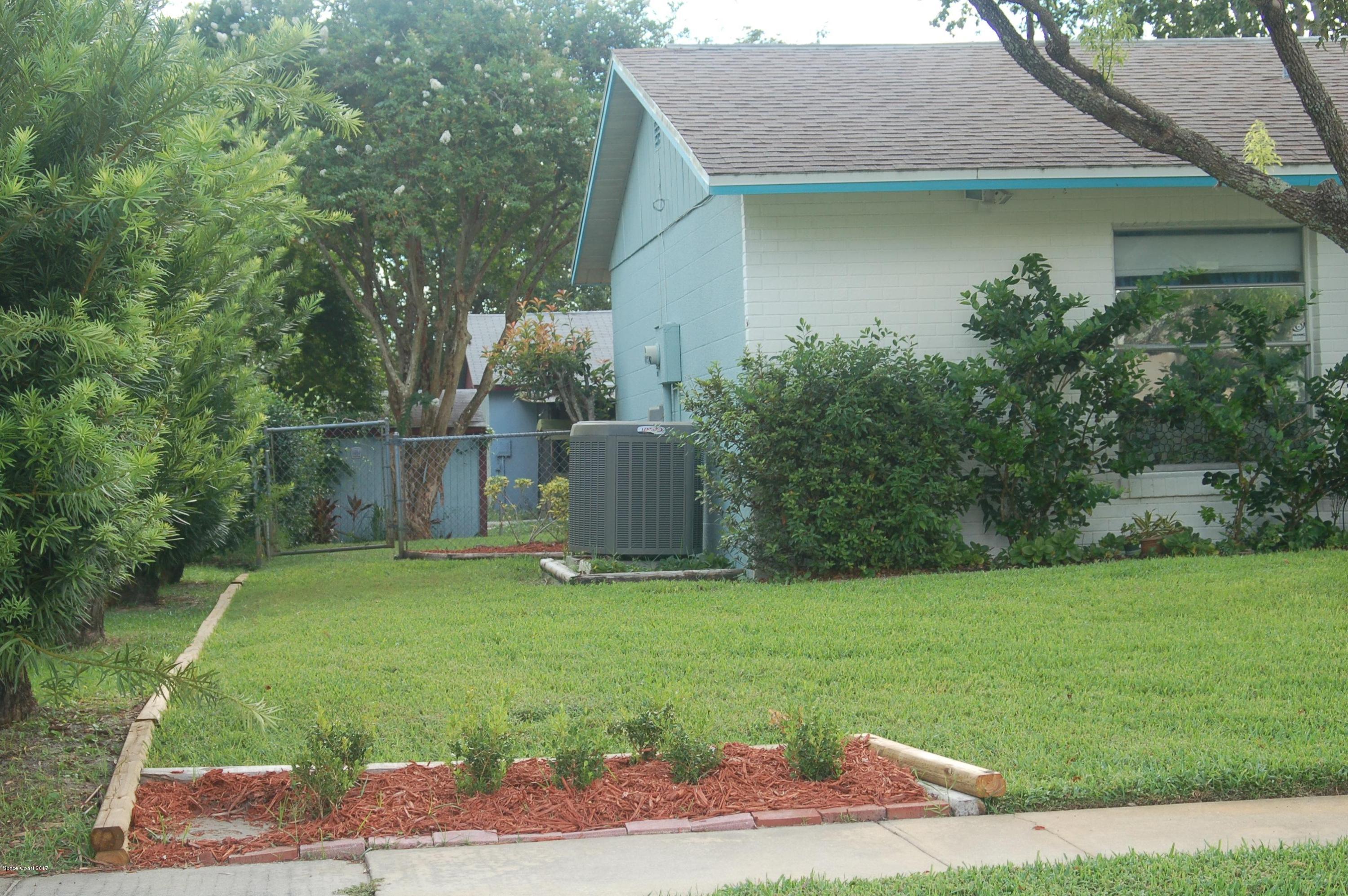 1557 West Powder Horn Road Titusville, FL 32796 - Photo 2 of 20 Front side
