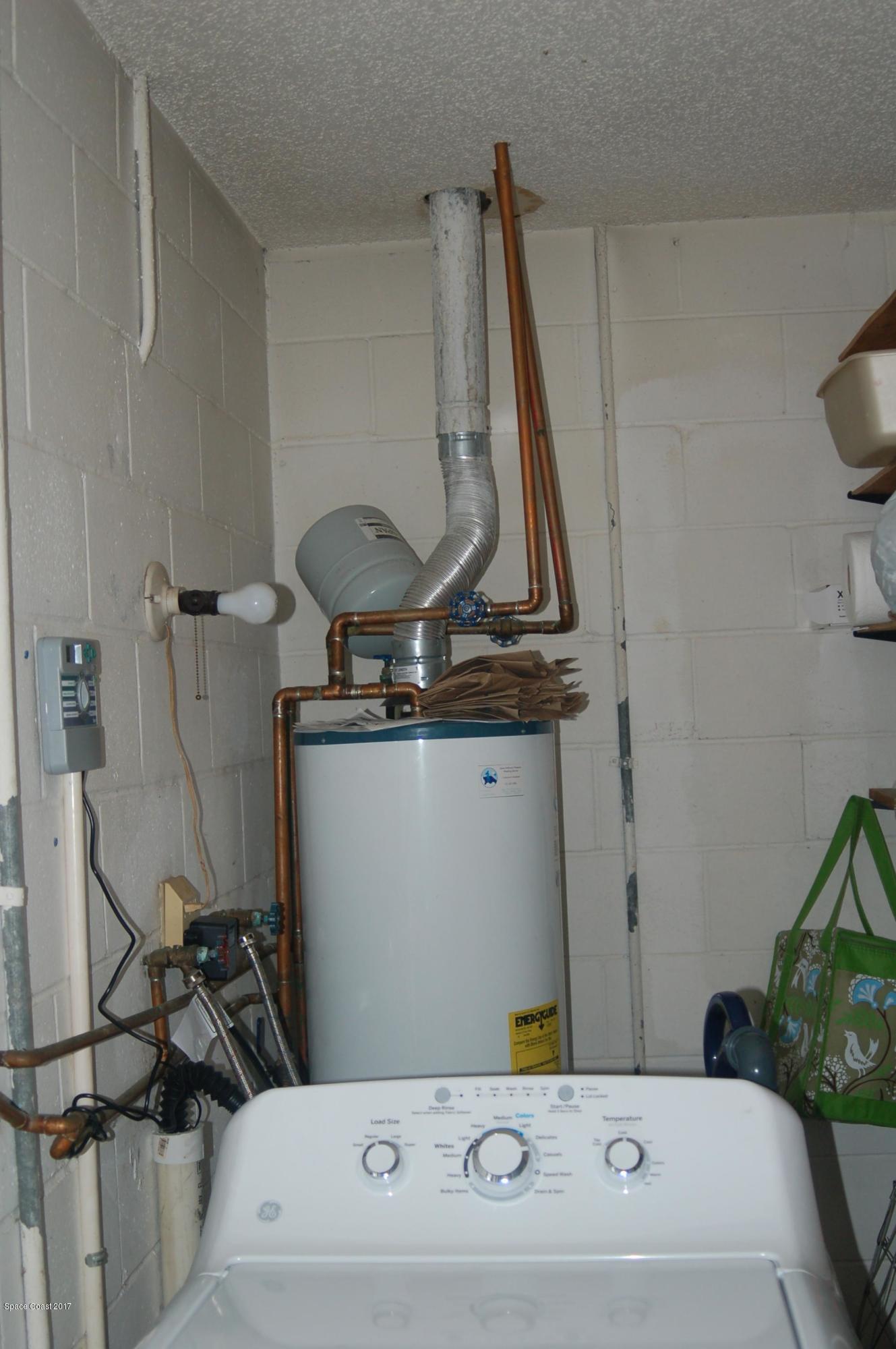 1557 West Powder Horn Road Titusville, FL 32796 - Photo 14 of 20 Laundry