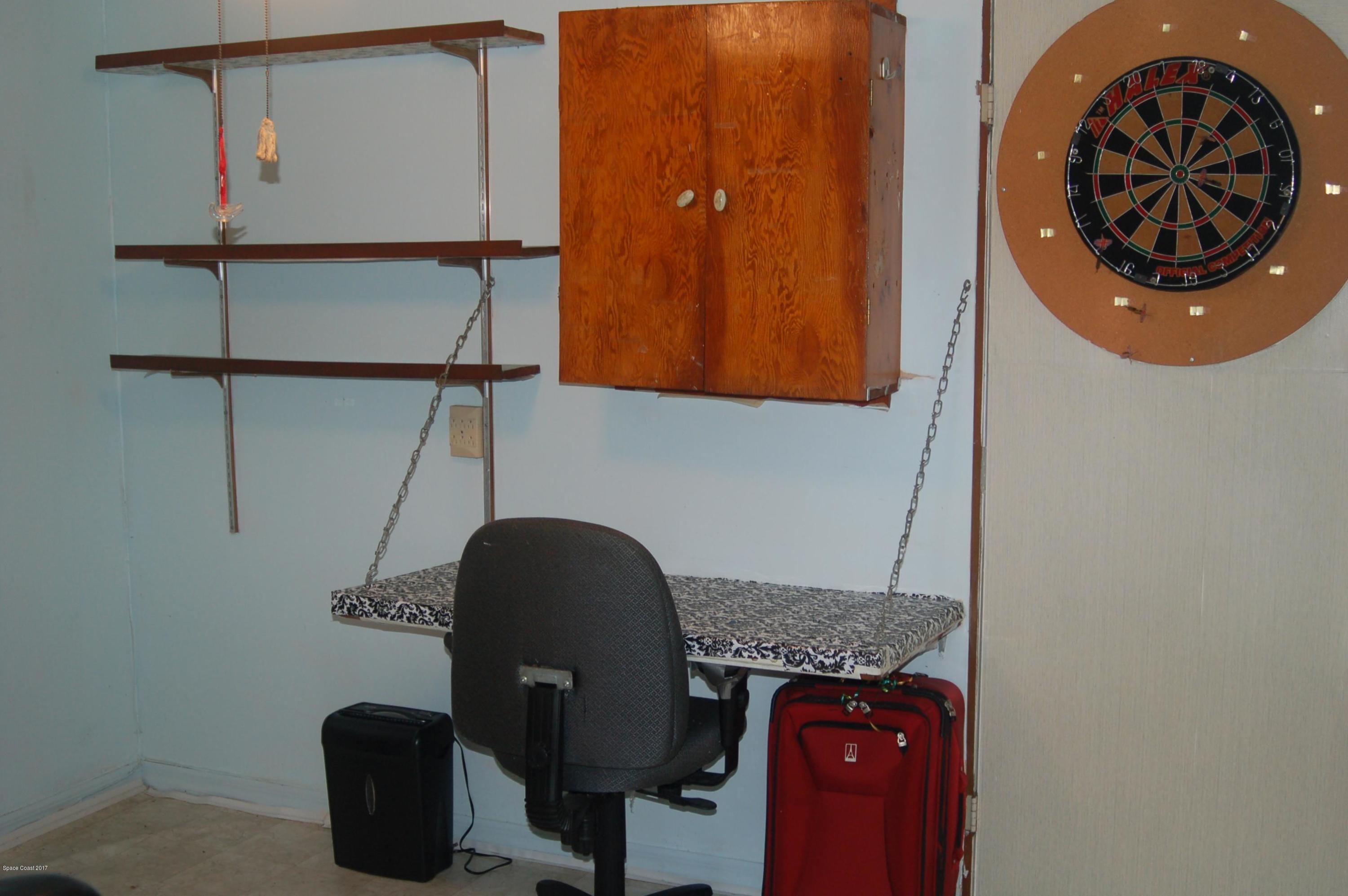 1557 West Powder Horn Road Titusville, FL 32796 - Photo 15 of 20 Exercise Room