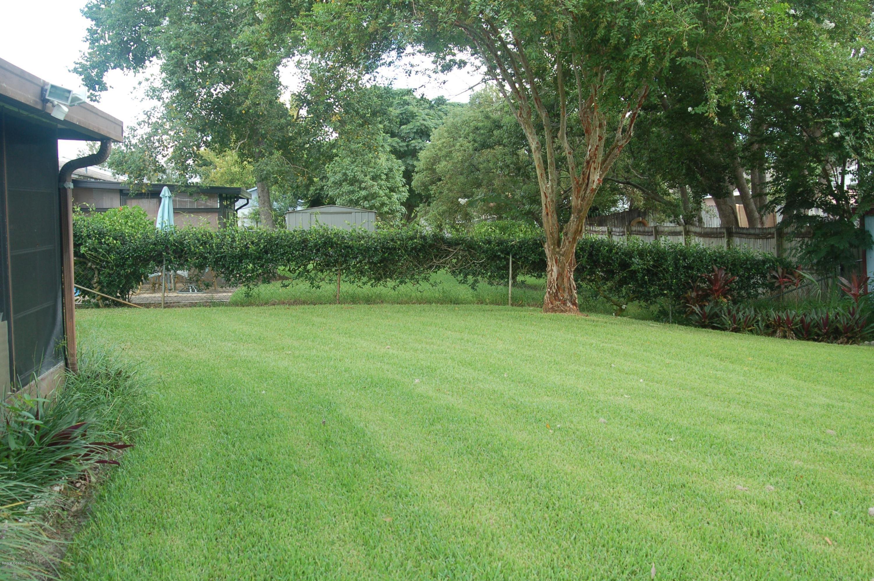 1557 West Powder Horn Road Titusville, FL 32796 - Photo 19 of 20 Back Yard