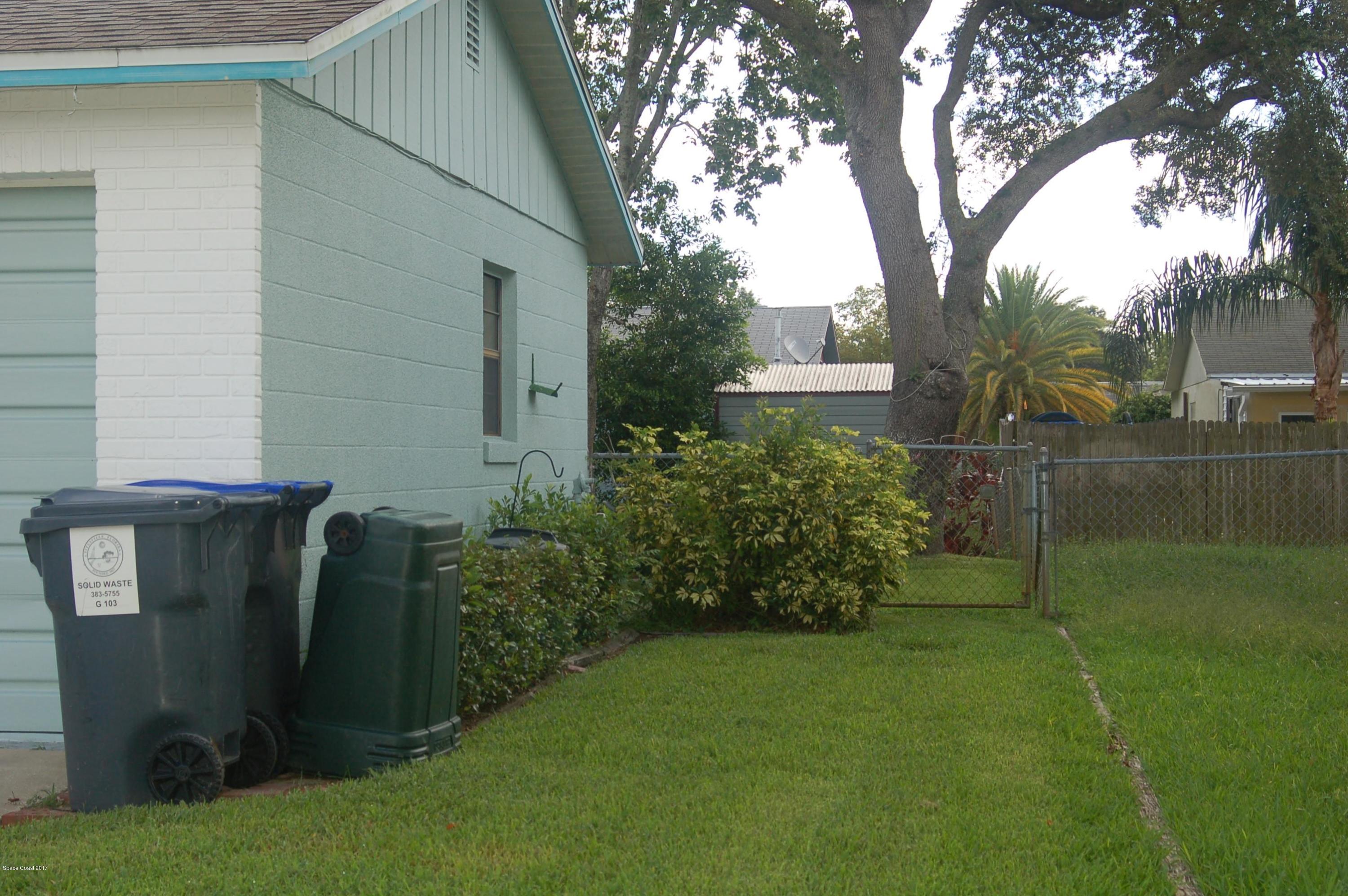 1557 West Powder Horn Road Titusville, FL 32796 - Photo 3 of 20 Front side