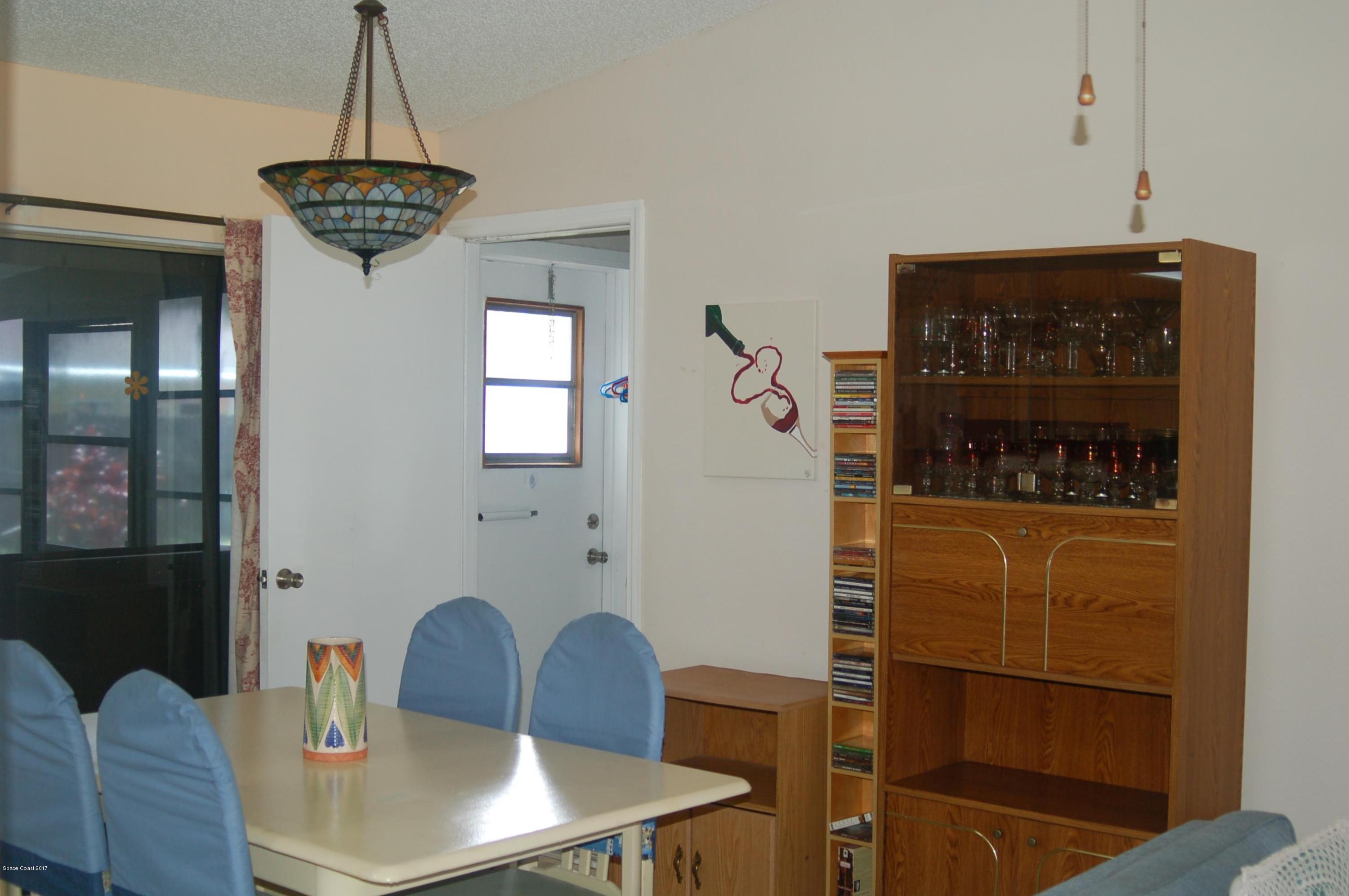 1557 West Powder Horn Road Titusville, FL 32796 - Photo 7 of 20 Dining