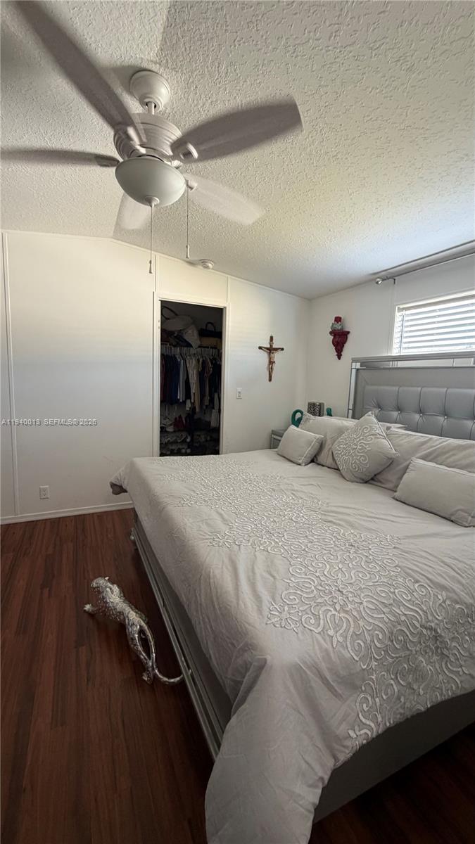 25345 Southwest 129th Place Homestead, FL 33032 - Photo 21 of 35 a bed room with a bed and a fireplace
