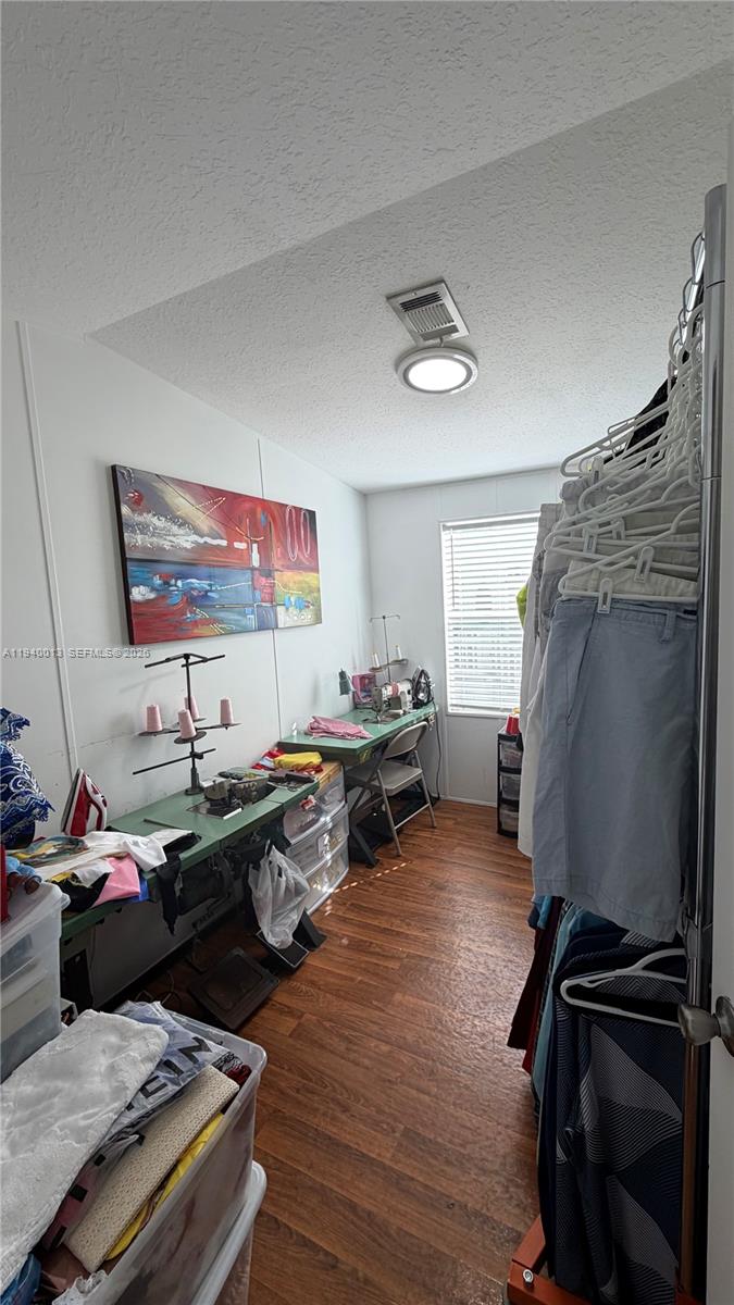 25345 Southwest 129th Place Homestead, FL 33032 - Photo 3 of 35 a living room with furniture and a flat screen tv