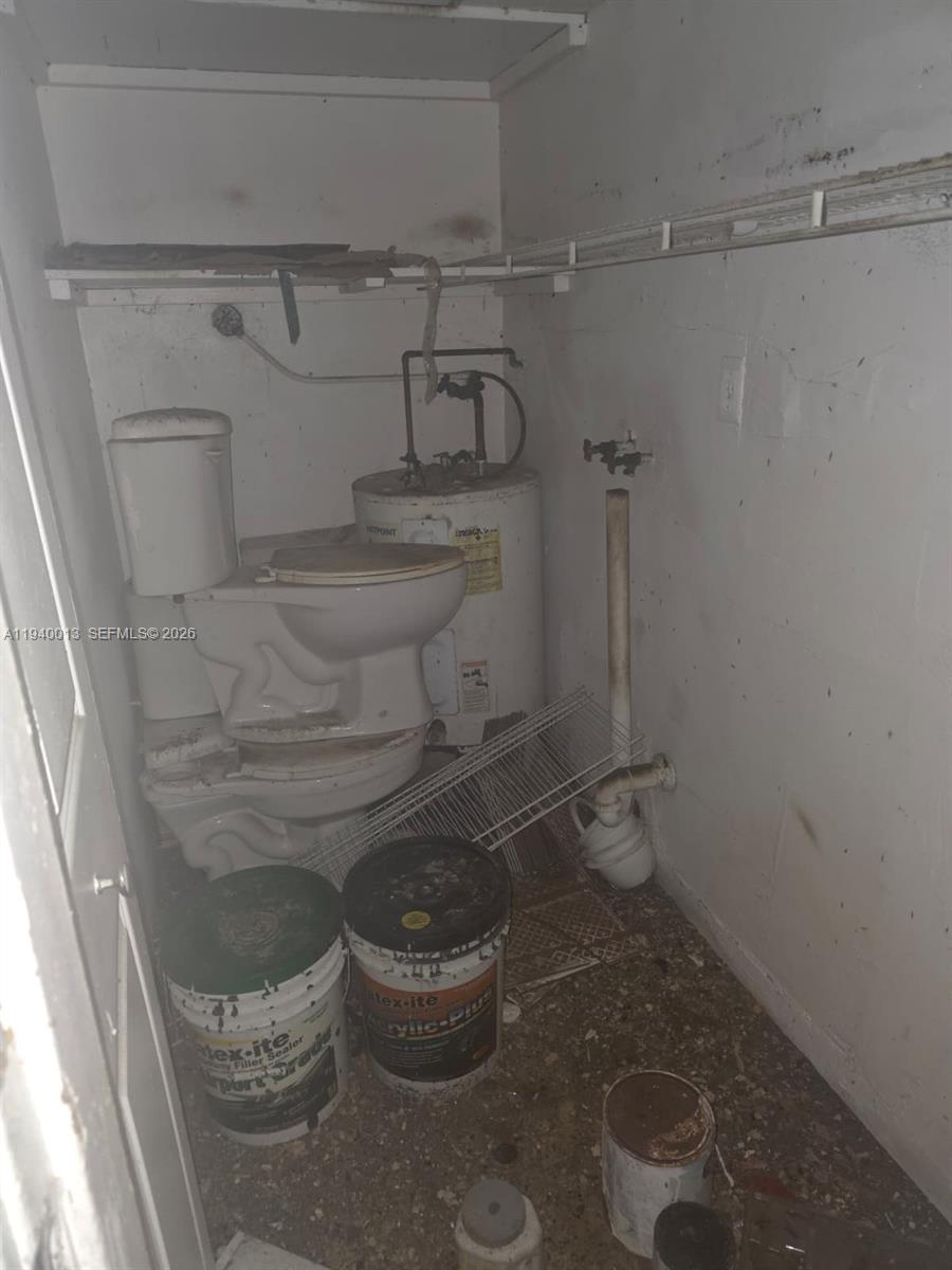 25345 Southwest 129th Place Homestead, FL 33032 - Photo 34 of 35 a bathroom with a toilet and a shower