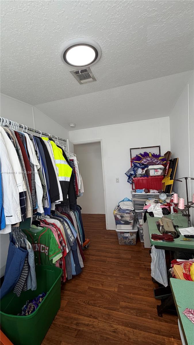 25345 Southwest 129th Place Homestead, FL 33032 - Photo 9 of 35 a view of a room with gym equipment