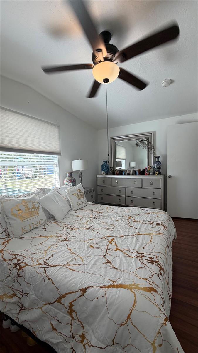 25345 Southwest 129th Place Homestead, FL 33032 - Photo 10 of 35 a bedroom with a bed and ceiling fan