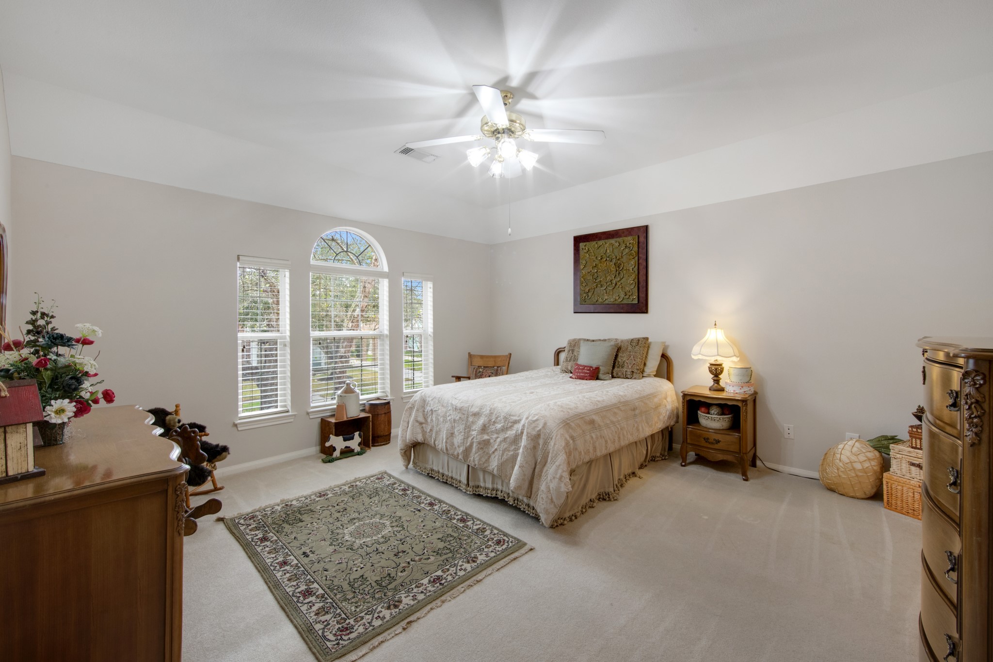 9510 Ashdown Forest Drive Spring, TX 77379 - Photo 37 of 50 BEDROOM 4 – spacious upstairs bedroom with vaulted ceilings and large windows overlooking the neighborhood. A comfortable and inviting space for family or guests.