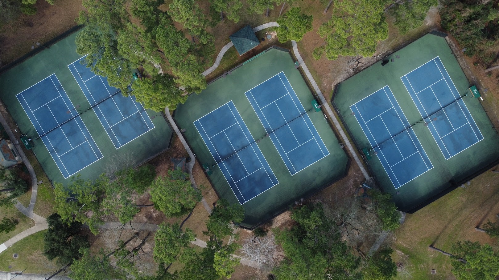 9510 Ashdown Forest Drive Spring, TX 77379 - Photo 47 of 50 COMMUNITY TENNIS COURTS – well-maintained tennis courts available for residents to enjoy recreational play and outdoor activity.