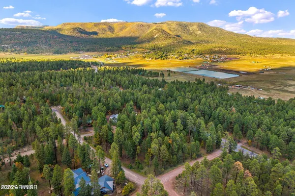 a view of an ocean and a mountain