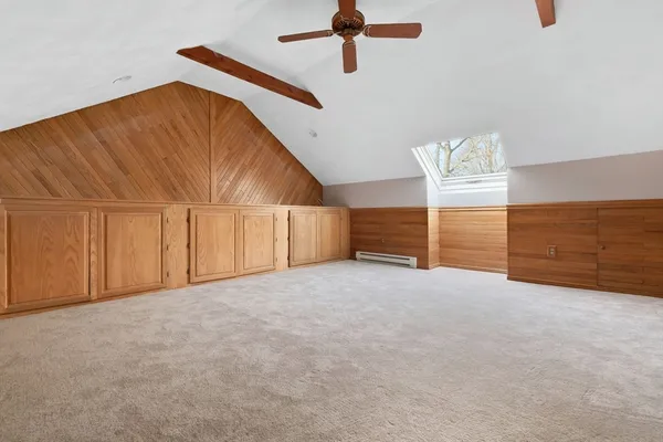 a view of a room with stairs and a window