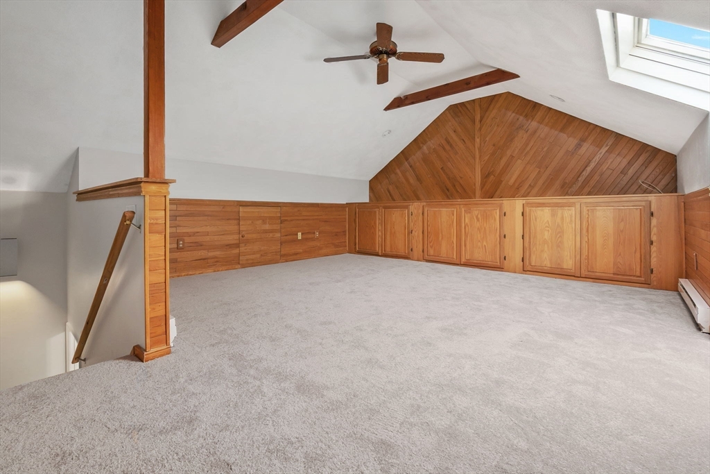 320 Newbury Street, Unit 304 Danvers, MA 01923 - Photo 17 of 32 a view of a room with stairs and a window